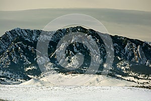 Flatirons Mountains in Boulder, Colorado on a Cold Snowy Winter