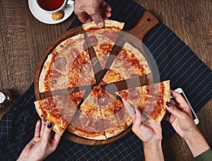 Flatlay. Friends eat pizza.