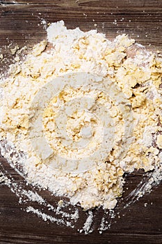 Flatlay, raw bright cookie dough or crumbles for bakery goods