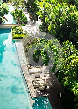 Flatlay sunbathing terrace pool side.