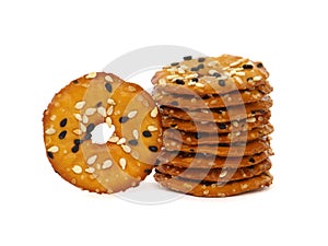 Flatten pretzel crackers with seeds isolated on white
