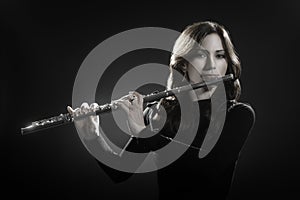 Flautist playing flute