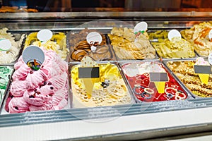 flavor of gelato ice-cream on display at the stall at food market