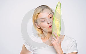 The flavor is so rich. healthy teeth. hunger. corn crop. vitamin and dieting food. woman eating corn. vegetable harvest