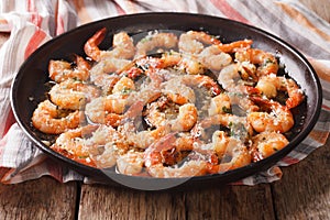 Flavorful food: shrimp in garlic sauce with parmesan cheese and