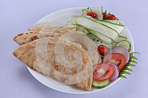 flavorful indian flatbread, flaky Paratha, a traditional indian cuisine.