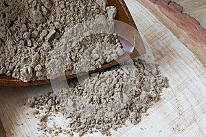 Flax flour on a wooden board