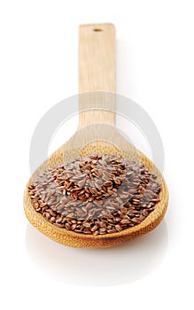 Flax-seed in wooden spoon