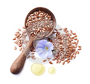 Flax seeds in closeup with drop oil