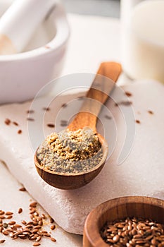 Flax seeds ground in spoon