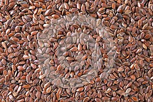 Flax seeds texture background.