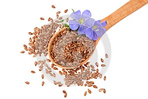 flax seeds in wooden spoon with flower isolated on white background. flaxseed or linseed. Cereals. top view photo