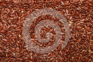 Flaxseed Culinary background. Flax seed close-up. Linseeds. Vegan and vegetarian cuisine. Top view, selective focus