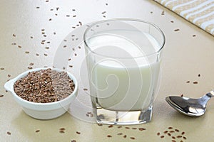 Flaxseed milk in a glass cup photo