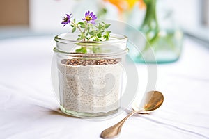 flaxseed smoothie in a cup with chia seed topping