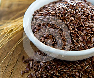 Flaxseeds in white bowl