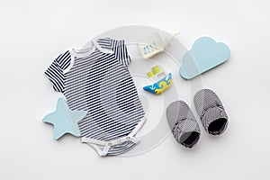 Flay lay of baby clothers and accessories. Top view photo