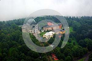 Flaying view on St. Hostyn, church and building