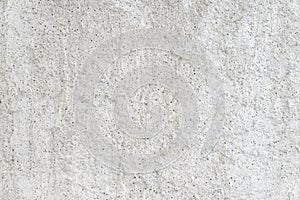 Flecked concrete surface background, texture