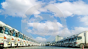 Fleet of trucks parked at parking lot yard of delivery company. Truck transport. Logistic industry. Freight transportation. Truck