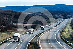 Fleet of White Tank truck or cistern on a Highway Road