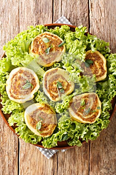 Fleischschnacka Traditional Ground Meat Dish From Alsace close-up in a plate. Vertical top view