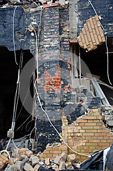 Flensburg Fahrensodde Burning Fire Airplane hanger. View of destroyed brickwork through the fallen wall photo