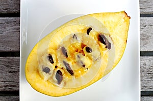 Flesh of the common pawpaw fruit photo