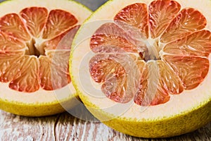 The flesh of a juicy fresh pomelo in close-up