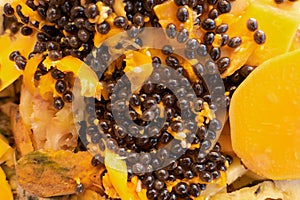 Flesh and seeds of a ripe papaya