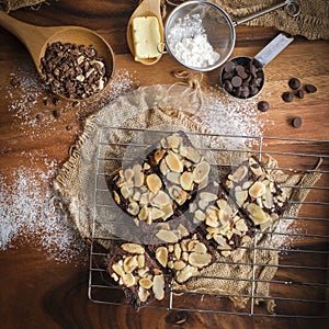 Fleshly baked almond brownies desert background photo