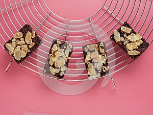 Fleshly baked almond brownies desert background