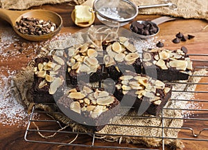 Fleshly baked almond brownies desert background