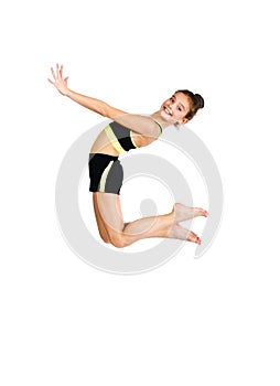 Flexible cute little girl child gymnast jumping and having fun isolated on a white background