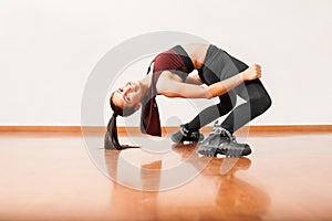 Flexible dancer bending backwards