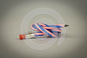 Flexible pencil on a light background. Selective focus