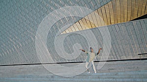 Flexible performer dancing contemporary street. Man showing modern choreography