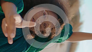 Flexible woman dancing sand dunes vertical closeup. Girl dancer bending body