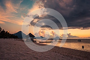 Flic and Flac, Mauritius in sunset light. Exotic beach sunset