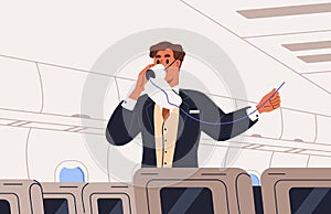 Flight attendant wears oxygen mask in air plane during safety instruction, demonstration for passengers. Steward photo