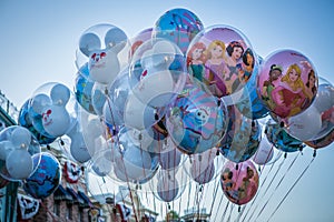 A flight of balloons hovering over Main Street USA, Disneyland