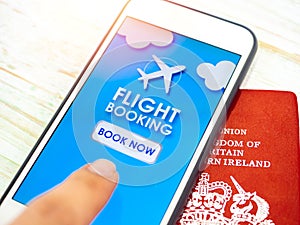 Flight booking application on smartphone with passport