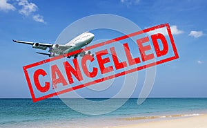 Flight cancellation. commercial airplane flight over the sea with red stamp text trip cancelled from city shutdown and border