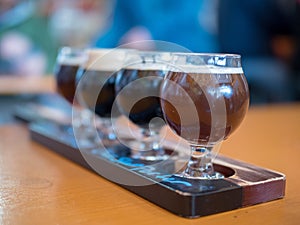 Flight of dark beers at a brewery