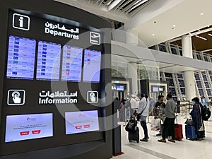 Flight Departures information board Bahrain Airport waiting room, schedule on electronic scoreboard, concept passenger traffic,