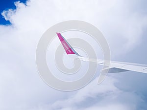 Flight Dortmund-Kyiv.July 2018 . View from airplane window: wing of `wizzair`