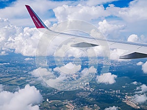 Flight Dortmund-Kyiv.July 2018 . Flight Dortmund-Kyiv.Juliy 2018. View from airplane window:wing of `wizzair` plane in cloudy sky