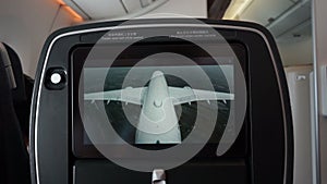 In flight entertainment screens show outside live camera view