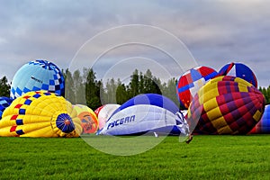 Flight of a group of hot air balloons in the summer