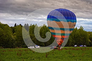 Flight of a group of hot air balloons in the summer